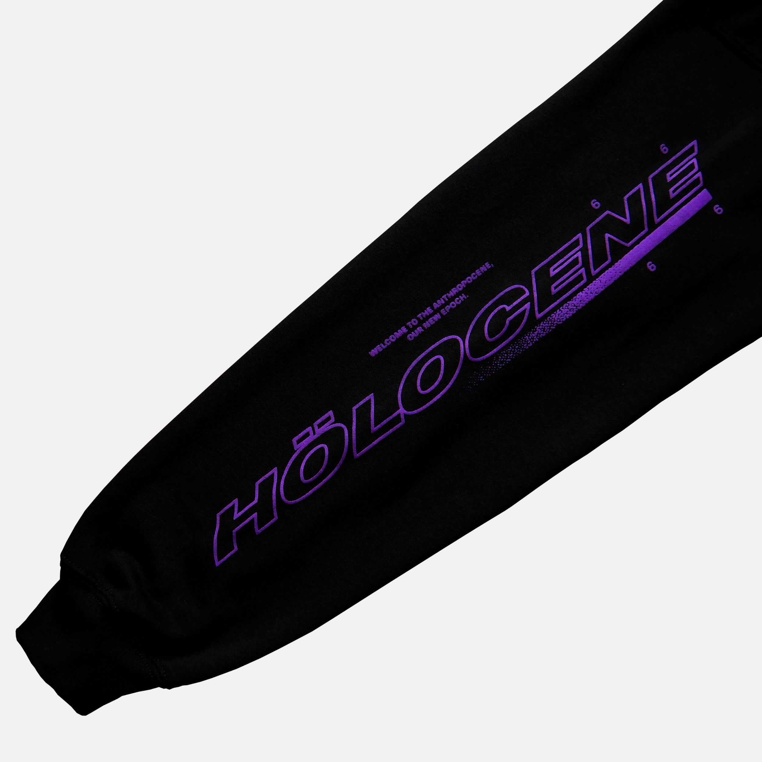 Sleeve close up view of the screen-pinted HOLOCENE black hoodie from PHOSIS Clothing