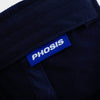 Close up view of the woven label in the ASCII Rose navy blue dad hat from PHOSIS Clothing