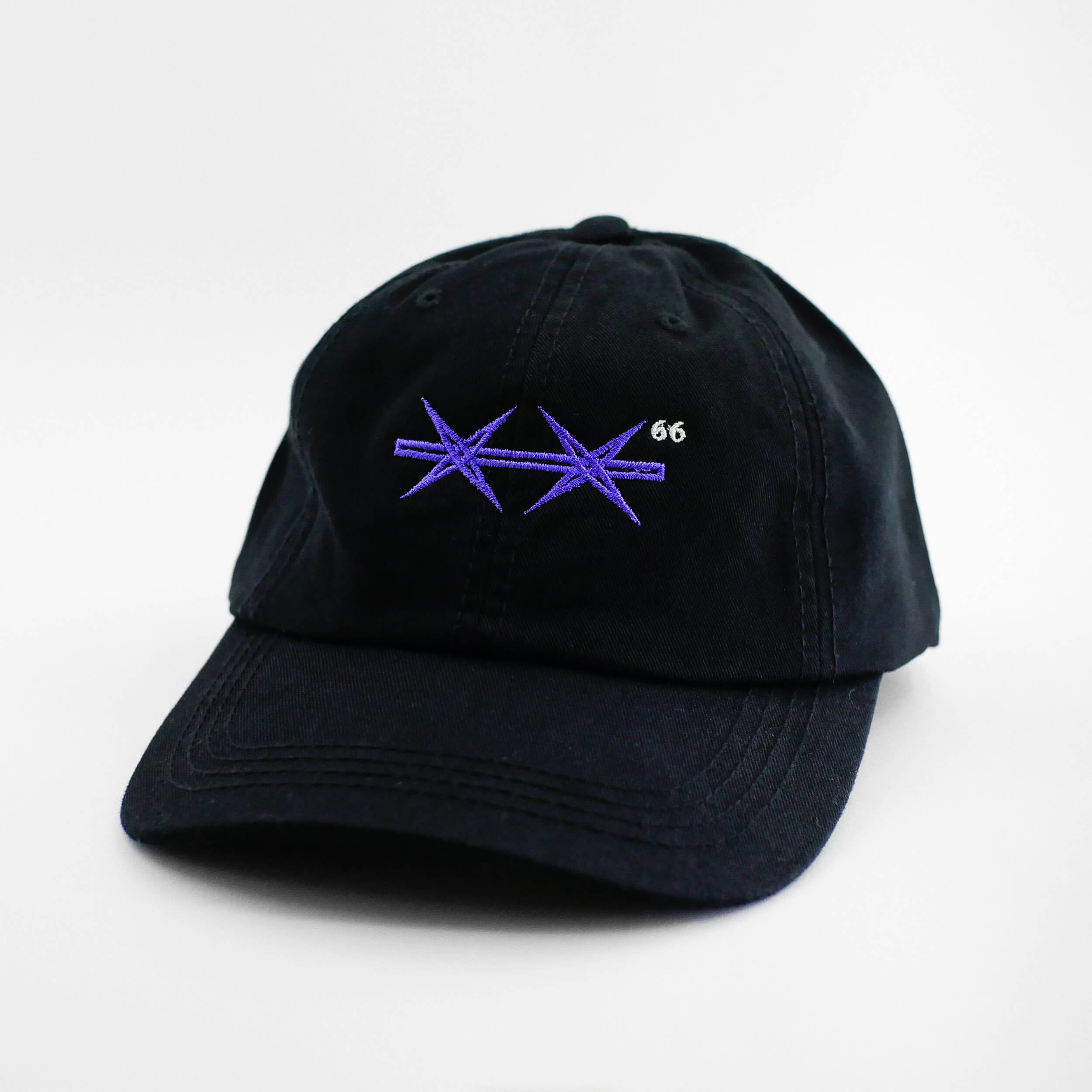 Angle view of the embroidered Barbed Wire black dad hat from PHOSIS Clothing