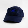 Angle view of the embroidered Buttterfly Logo navy blue dad hat from PHOSIS Clothing