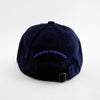 Back view of the embroidered 'FLAMBE' navy blue hat from PHOSIS Clothing