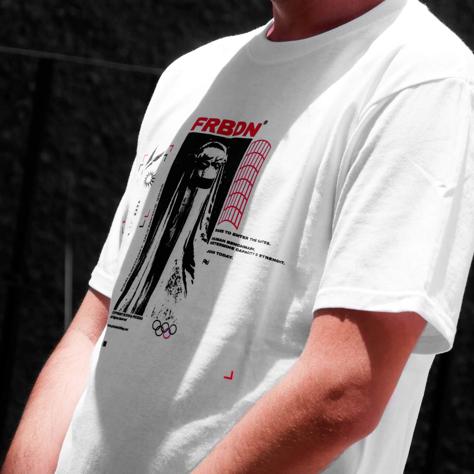 Close up view of model wearing FORBIDDEN white t-shirt from PHOSIS Clothing