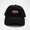 Load image into Gallery viewer, Front view of the embroidered MOB black dad hat from PHOSIS® Clothing